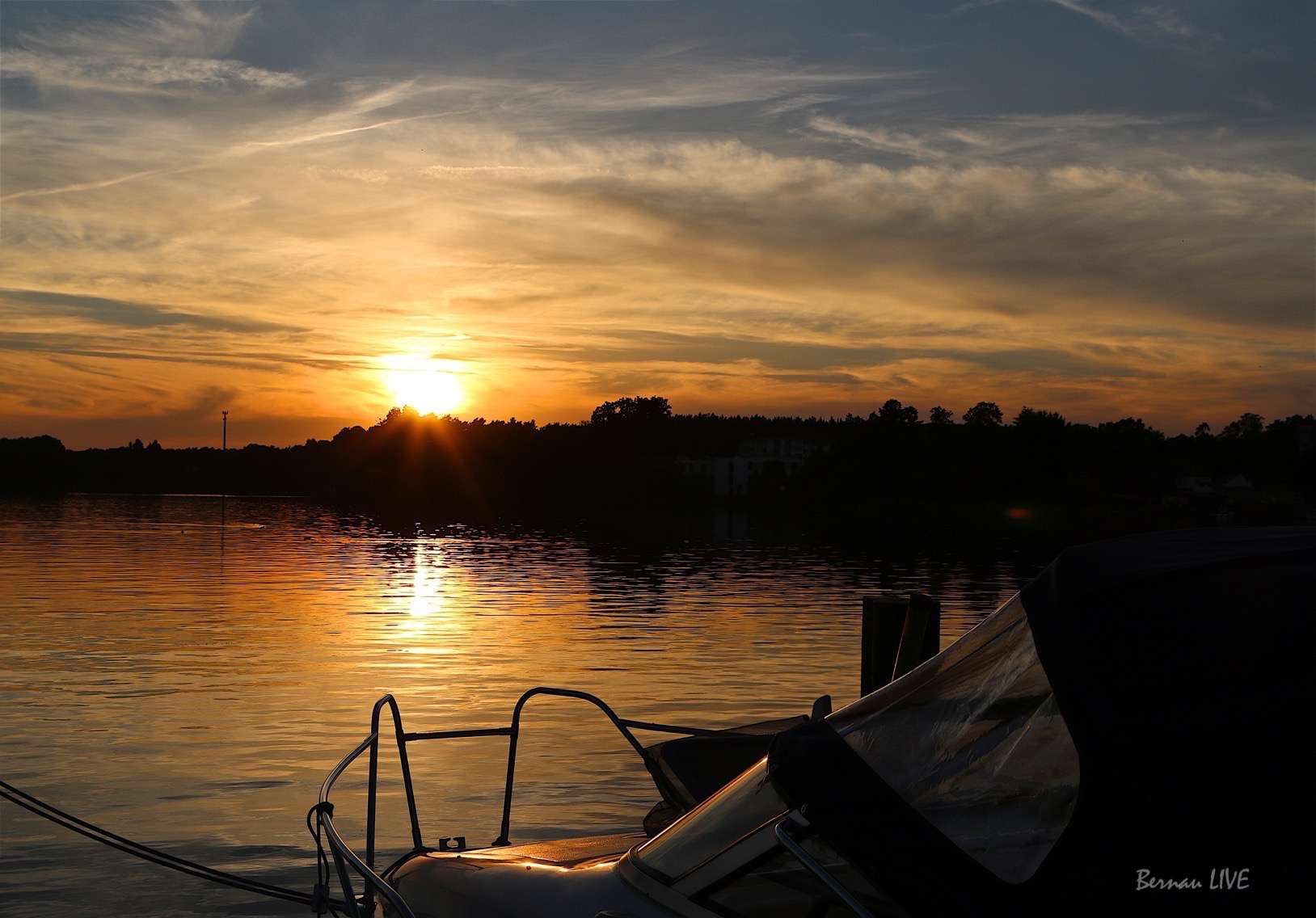 Barnim: Sonnenuntergang am See mit Boot